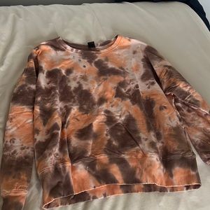 orange and brown crewneck